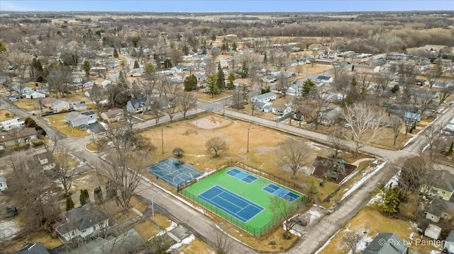 birds eye view of property with a residential view