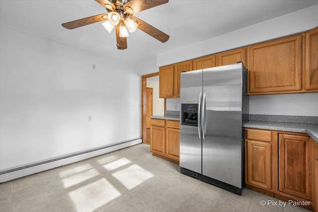 kitchen featuring a baseboard radiator, brown cabinets, and stainless steel fridge with ice dispenser