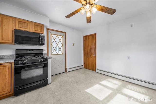 kitchen featuring baseboard heating, brown cabinets, and black appliances