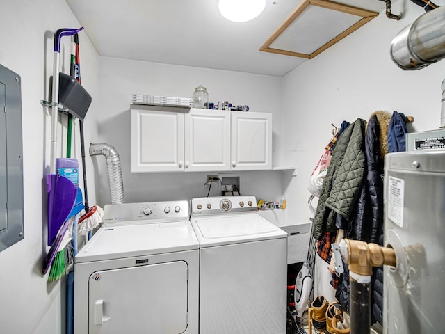 laundry room featuring cabinets and washer and dryer