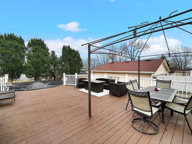 deck with an outdoor living space