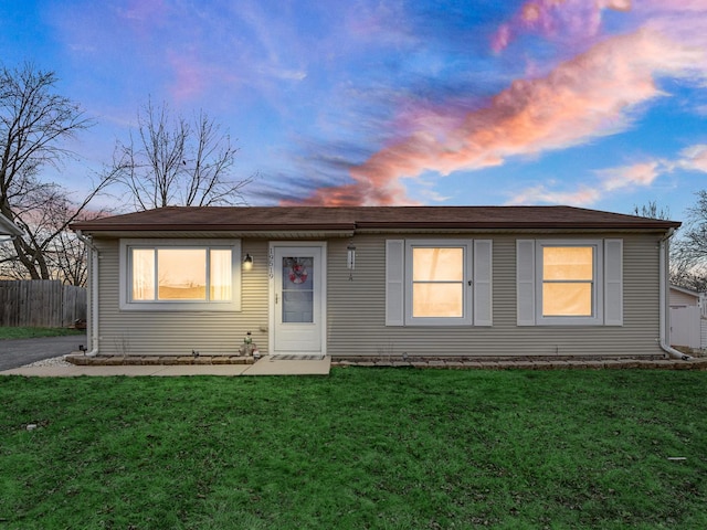 view of front of house with a lawn