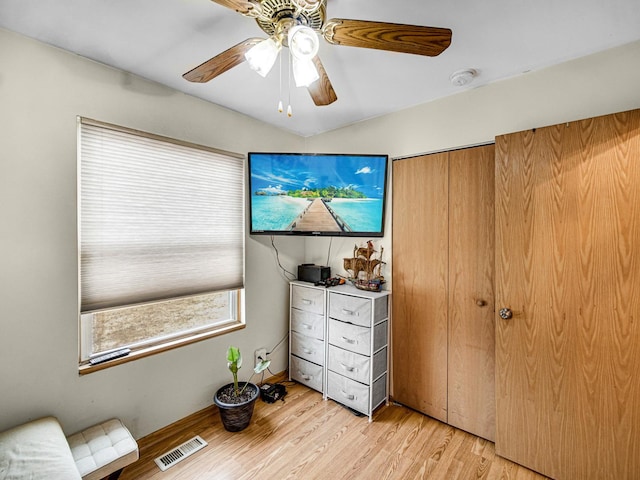 interior space featuring ceiling fan and light wood-type flooring