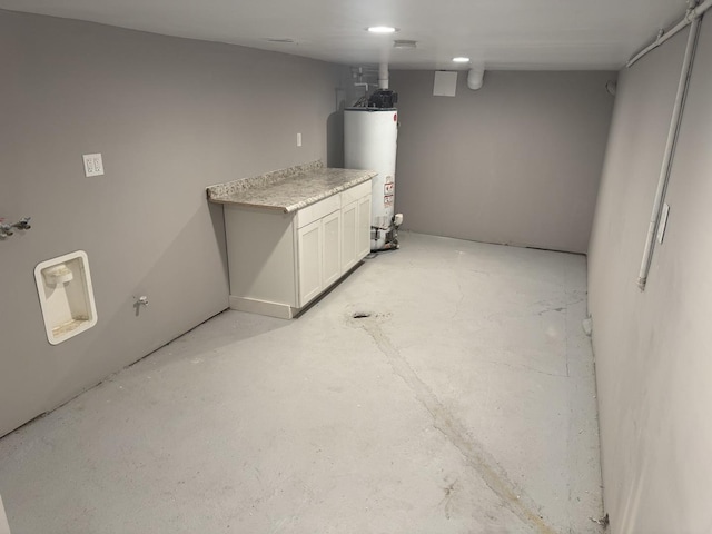 basement featuring water heater