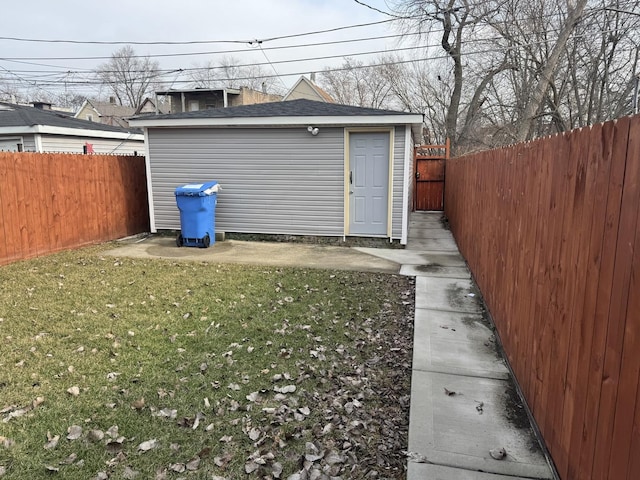 view of outdoor structure with a lawn