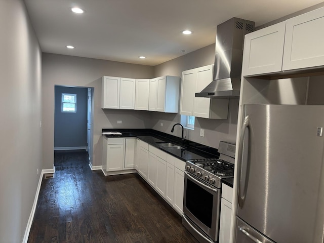 kitchen with white cabinetry, appliances with stainless steel finishes, ventilation hood, and sink