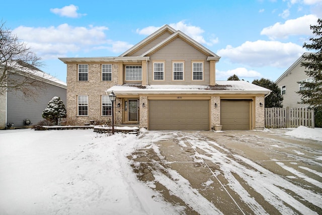 view of front of home with a garage