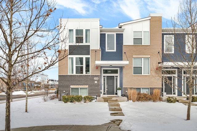 multi unit property featuring brick siding