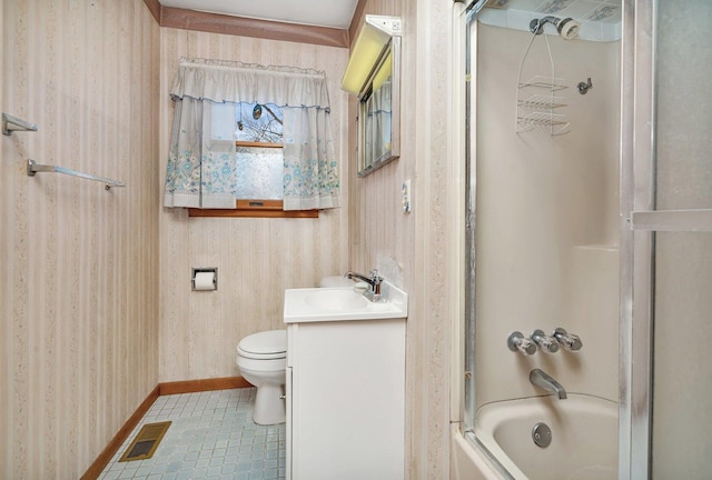 full bathroom with vanity, tile patterned floors, washtub / shower combination, and toilet