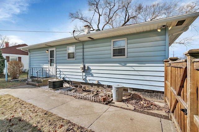 view of home's exterior featuring central AC unit