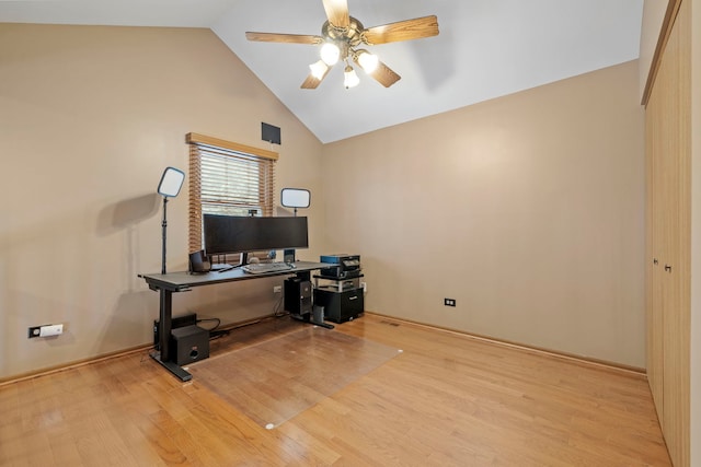 office with vaulted ceiling, ceiling fan, and light hardwood / wood-style floors