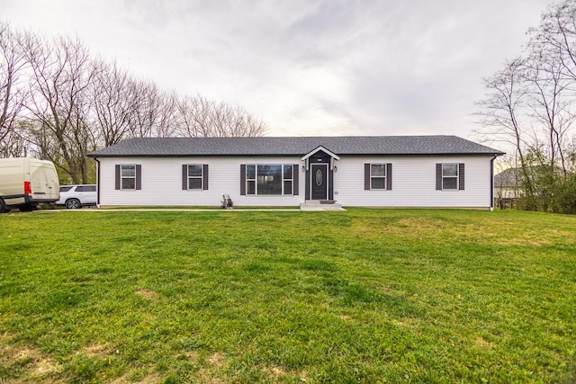 view of front of home with a front yard