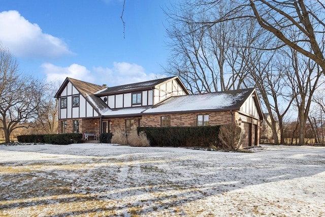 view of snow covered property