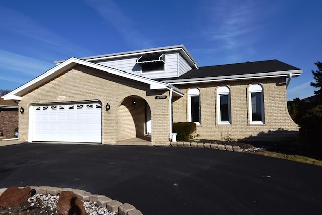 view of front of property featuring a garage