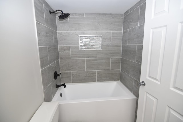 full bath featuring tub / shower combination