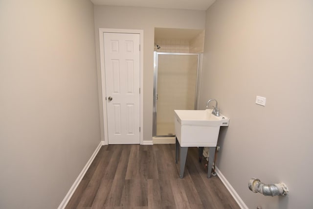 16701 Clyde Ave, South Holland, IL 60473 - full bathroom with wood finished floors and a shower stall
