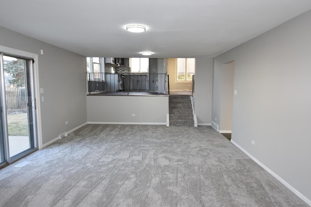 16701 Clyde Ave, South Holland, IL 60473 - spare room with dark colored carpet and healthy amount of natural light