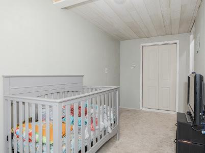 bedroom with carpet floors and a closet