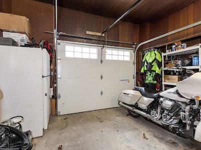 garage with white fridge