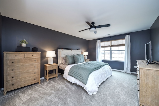 bedroom featuring lofted ceiling, carpet flooring, and ceiling fan