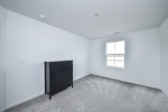 empty room featuring carpet floors