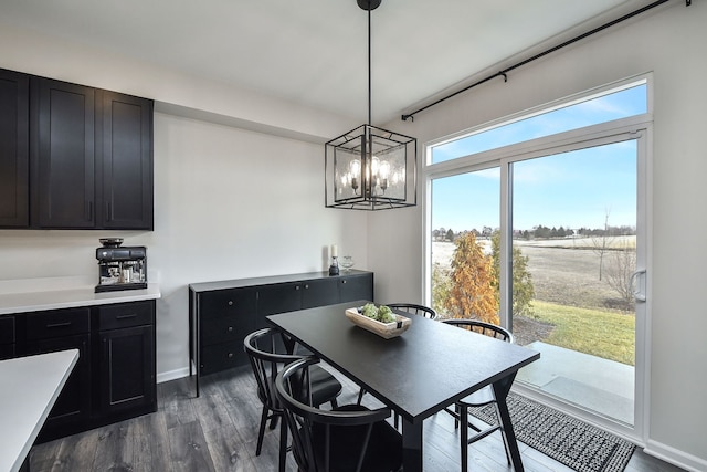 dining room with dark hardwood / wood-style flooring