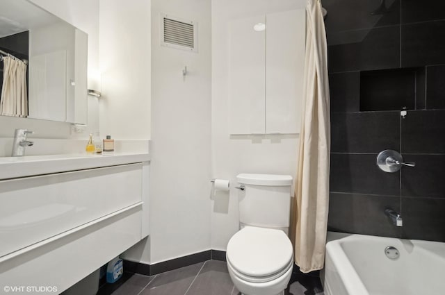 full bathroom with shower / tub combo, vanity, tile patterned flooring, and toilet