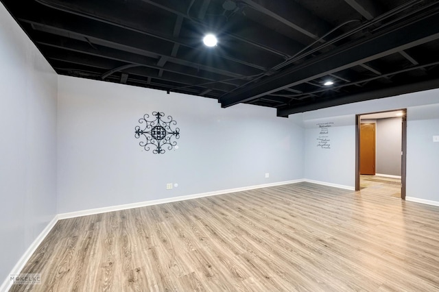 basement featuring hardwood / wood-style flooring