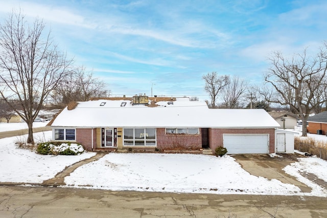 ranch-style home with a garage