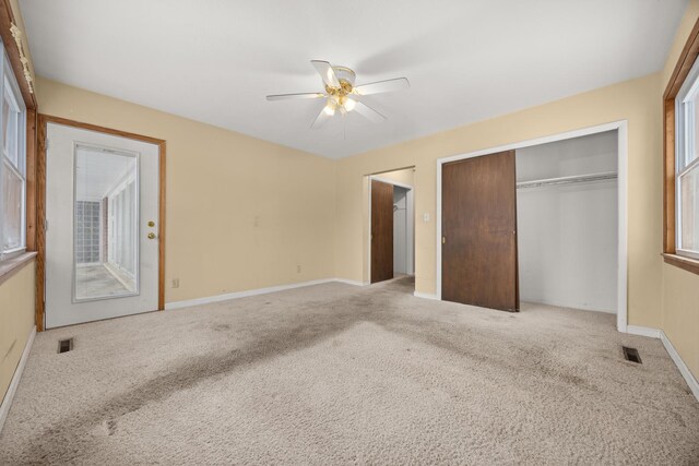 bathroom with ornamental molding, vanity, and a bath