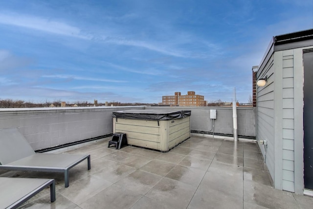 view of patio featuring a hot tub