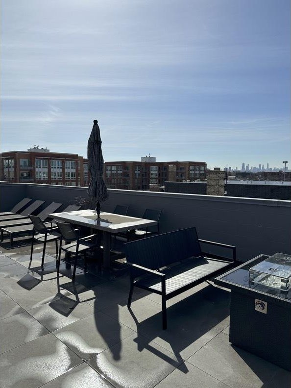 view of patio with a balcony