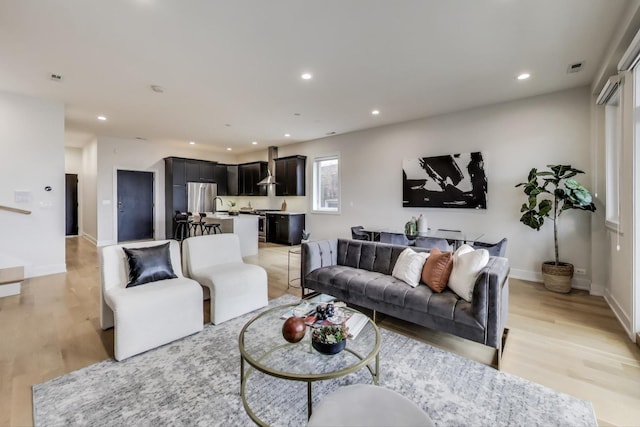 living room featuring light wood-type flooring