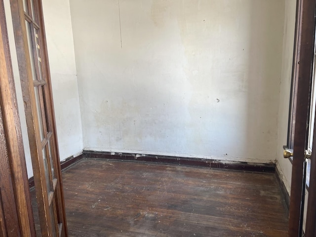 empty room featuring hardwood / wood-style flooring