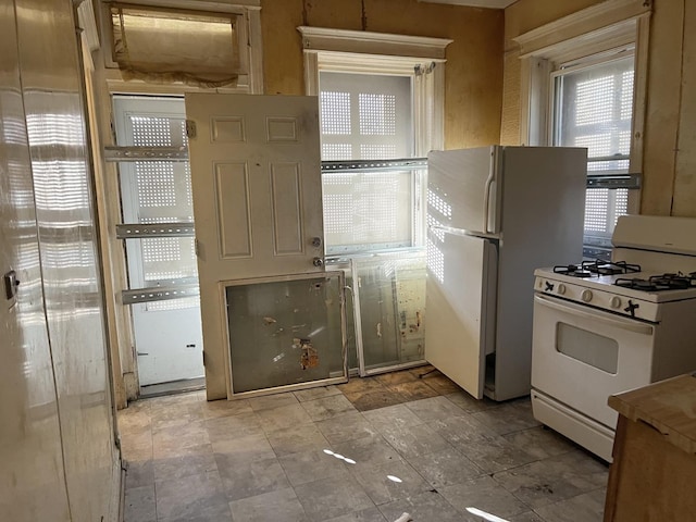 kitchen featuring white appliances