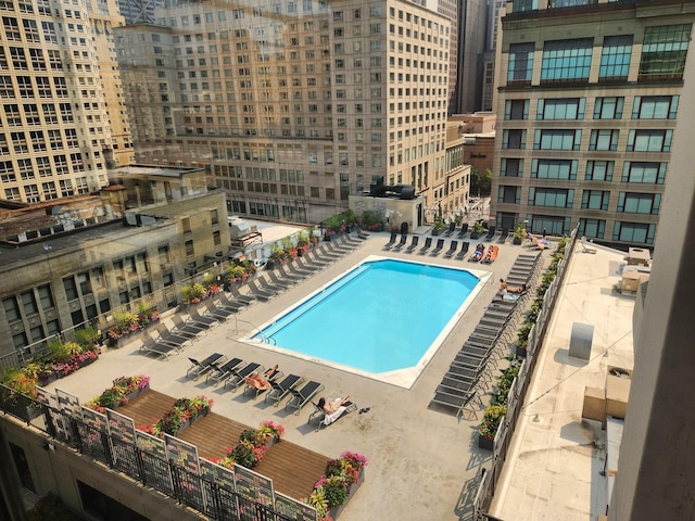 view of swimming pool with a patio area