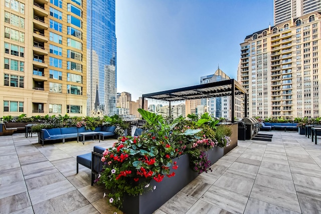 view of patio featuring a pergola and an outdoor hangout area