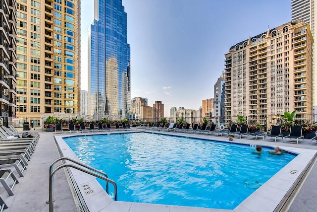 view of swimming pool with a patio area