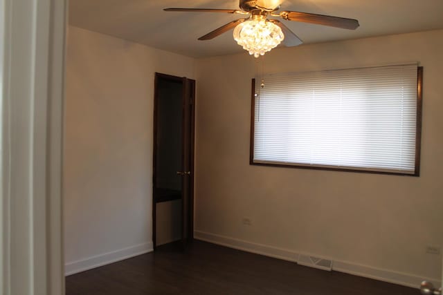 17544 Roy St, Lansing, IL 60438 - empty room featuring ceiling fan and dark hardwood / wood-style floors