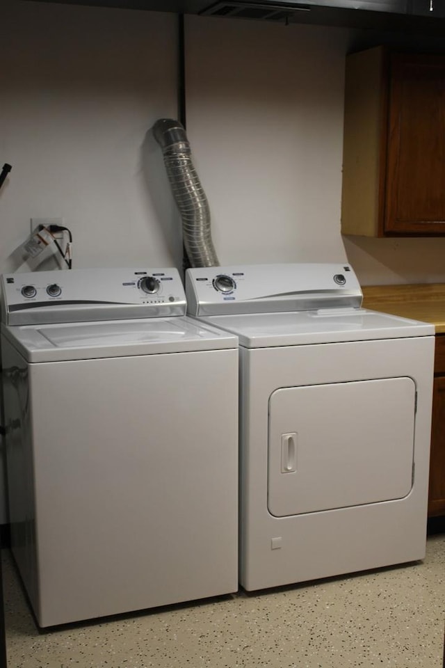 17544 Roy St, Lansing, IL 60438 - clothes washing area featuring cabinets and washing machine and dryer
