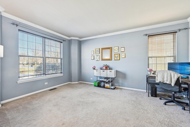 office area with crown molding and light colored carpet