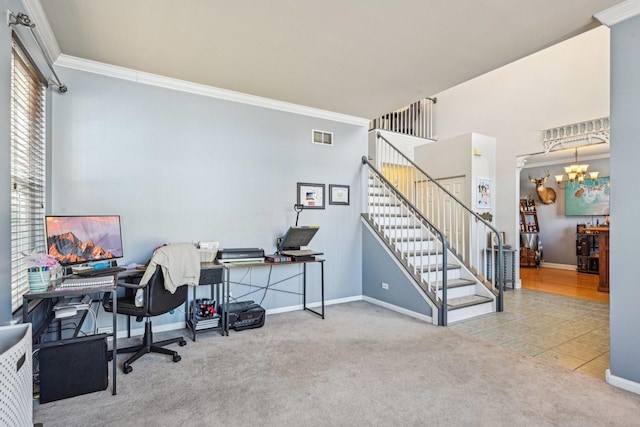 home office with an inviting chandelier, ornamental molding, and carpet