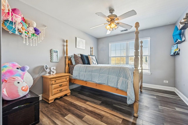 bedroom featuring dark hardwood / wood-style flooring and ceiling fan