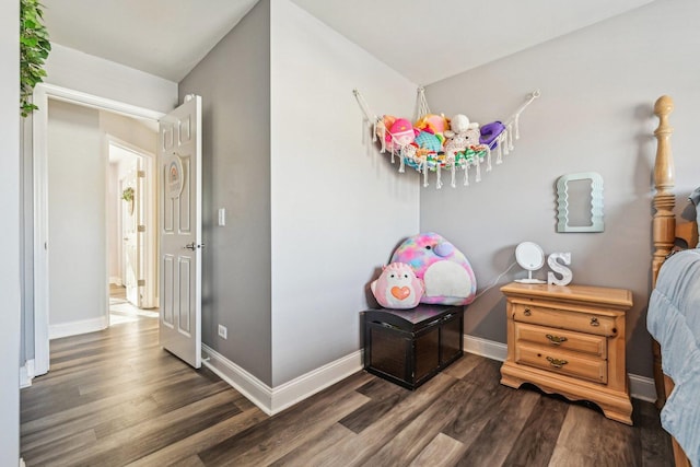 bedroom featuring dark hardwood / wood-style flooring