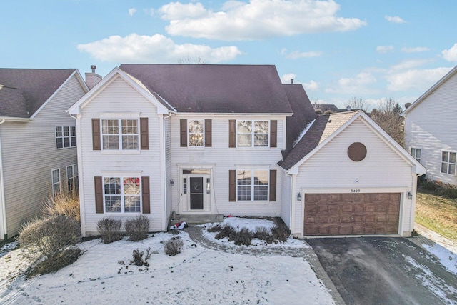 view of front of property with a garage