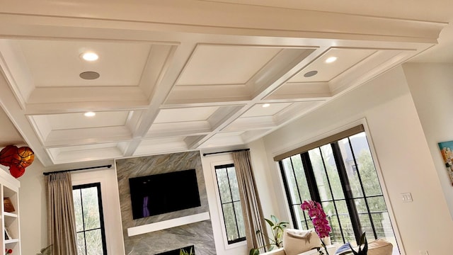 interior space featuring beamed ceiling, coffered ceiling, and recessed lighting