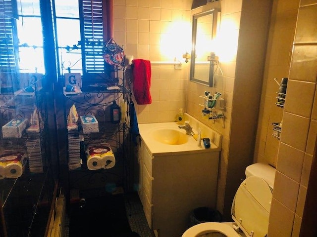 bathroom with vanity and toilet