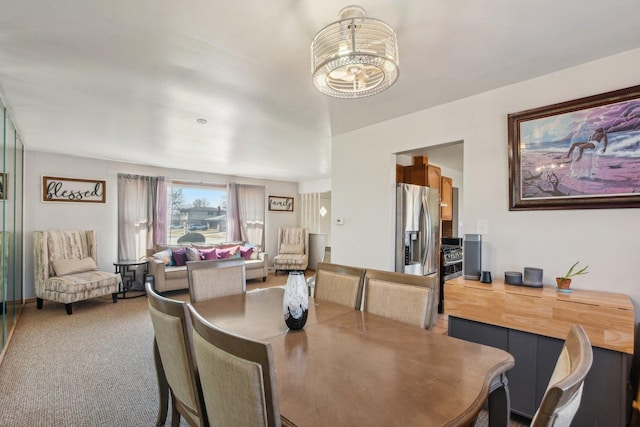 dining area with light carpet