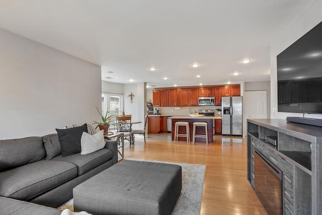 living room with light hardwood / wood-style floors