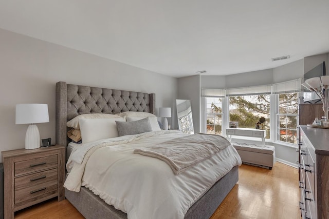 bedroom featuring light hardwood / wood-style floors